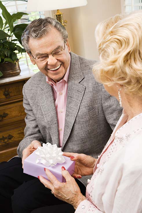 Mature couple with present.